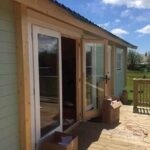 PVC double doors on the Spiddal log cabin
