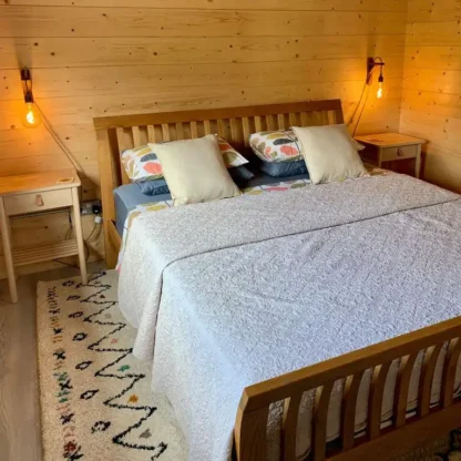 Bedroom in Adare 3 bed log cabin