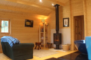 Stove in a two bed log cabin