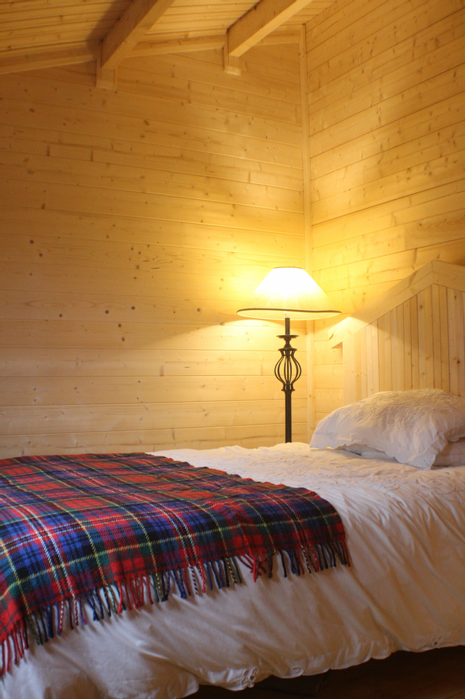 Cosy log cabin bed