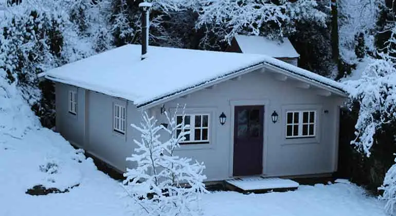 Limerick log cabin in snow