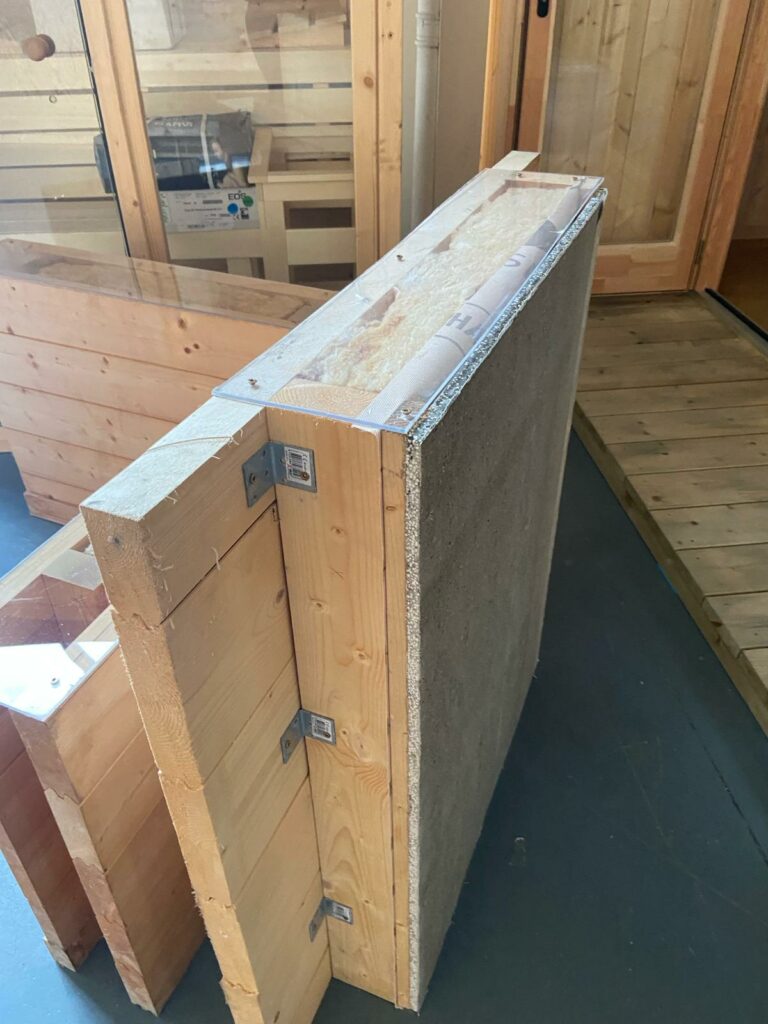 Log cabin wall with cement board