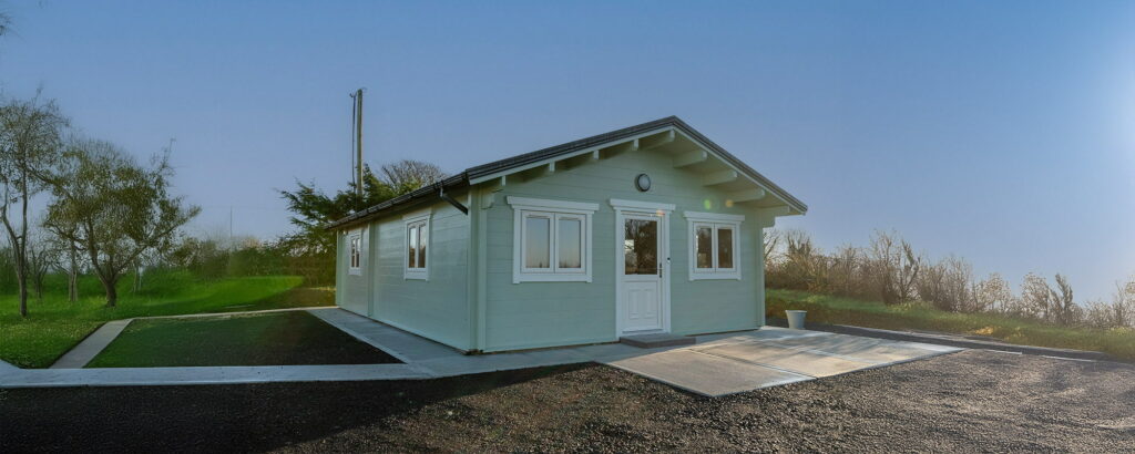 a small house with a driveway