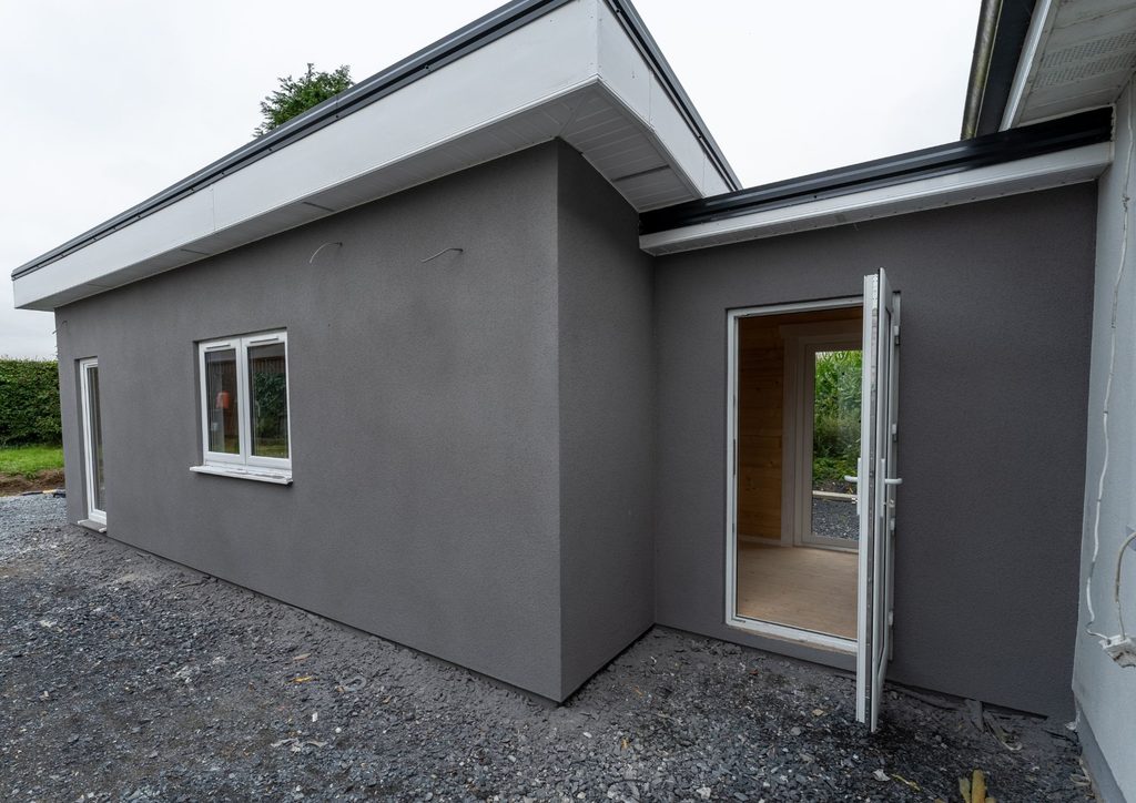 Exterior of cement board exterior home extension